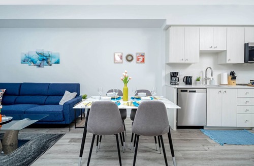 Kitchener Apartment | Modern High-Rise 24th Floor Condo w Private Patio