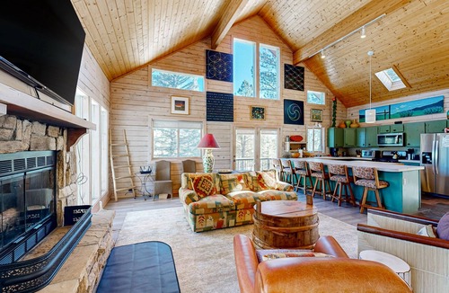 Angel Fire House | Mountain cabin with WiFi, expansive deck, fireplace, & forest views