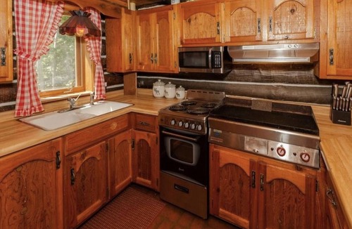 Spooner Cabin | Peaceful retreat on Yellow River. Kayak, canoe or explore our 20 wooded acres!