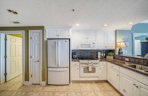 Lower Grand Lagoon Condo | Pet Friendly Treasure Island 1504- Heated Pool, Gym, FREE Golf &Beach Service