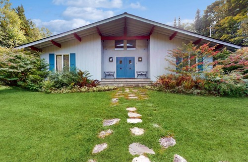 Peru House | Picturesque, Euro-style ski chalet with beautiful setting, deck & fireplace