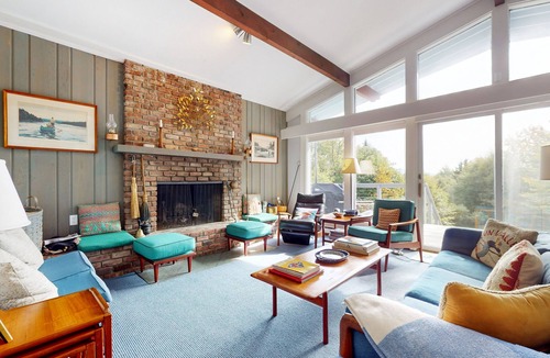 Peru House | Picturesque, Euro-style ski chalet with beautiful setting, deck & fireplace