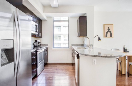 Woodmont Triangle Apartment | Premium Bethesda Bainbridge 2BR w/Concierge, Gym, W/D, walk to Metro, by Blueground