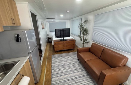 Pecos Apartment | Private Duplex Studio Suite with Queen Bed, Kitchenette and Private Bathroom.