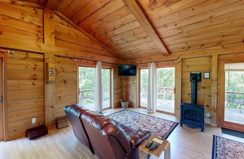 Norwalk Cabin | Quaint cabin overlooking the creek below and wetlands in the valley basin.