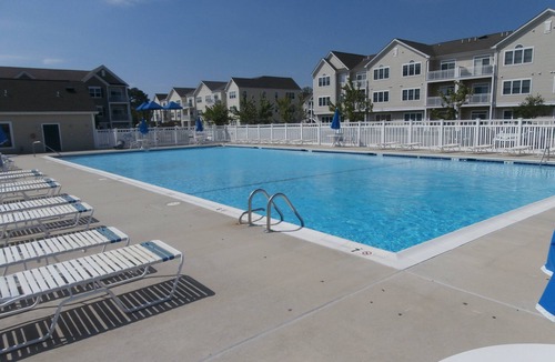 The Glade House | Resort Style Community Rehoboth Beach House Parking Pool