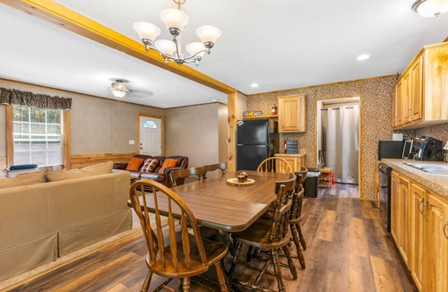 Schroon Lake House | Riverfront home with huge screened deck - dog-friendly & fast WiFi