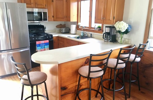 West of Town House | Rustic cozy home near downtown Nantucket with heated private pool & hot tub
