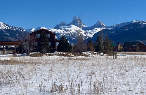 Driggs House | Rustic dog-friendly mountain-view home with fireplace, grill, & Ping-Pong