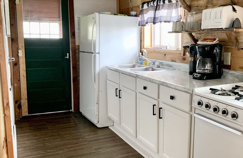 Garrison Resort | Rustic log cabin built in the 1900's! On Private Lake with Great Fishing.