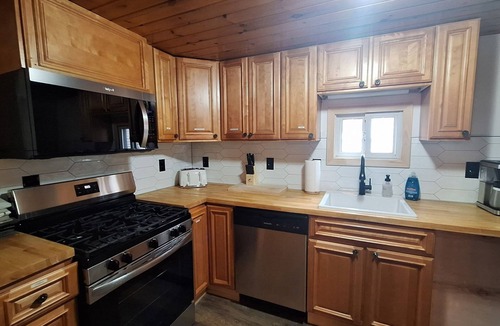 Maple View House | Rustic Riverside Charm and Exclusive Fishing Access!