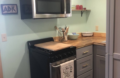 Bloomingdale Apartment | Saranac Lake Adirondack Modern Loft-fire pit, river access, 100 acre forest