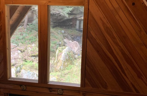 Rogers Cabin | Secluded A-Frame Cabin with a private waterfall at Spirit Lake and internet
