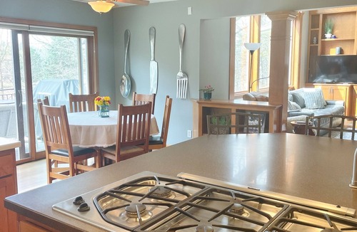 Stillwater House | Secluded Lakefront Home with outdoor hot tub, fire pit & indoor Hockey Rink