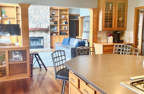 Stillwater House | Secluded Lakefront Home with outdoor hot tub, fire pit & indoor Hockey Rink