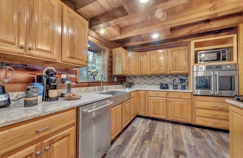 Newfoundland Cabin | Secluded Log Cabin w/Hot Tub, Fire Pit, Game Room