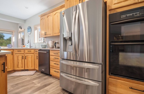Surf Pines House | Serene coastal ambiance, fenced yard, fire pit, and outdoor furniture!