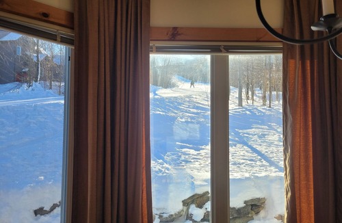 North Troy Condo | Ski in & out on Grammy Jay—right next to the ski run + view of Grammy Jay.