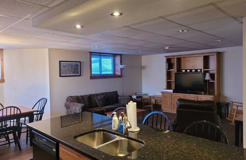 North Troy Condo | Ski in & out on Grammy Jay—right next to the ski run + view of Grammy Jay.