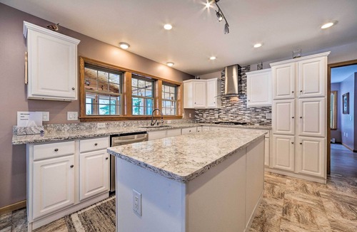 Rogers City House | Spacious Lakefront Home w/Sunroom & Bar!
