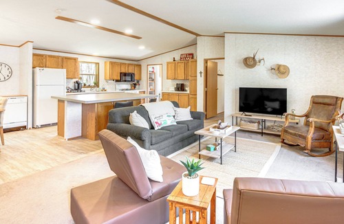 Puposky Cabin | Tenstrike Lake House on 60 Acres: Hike & Fish!