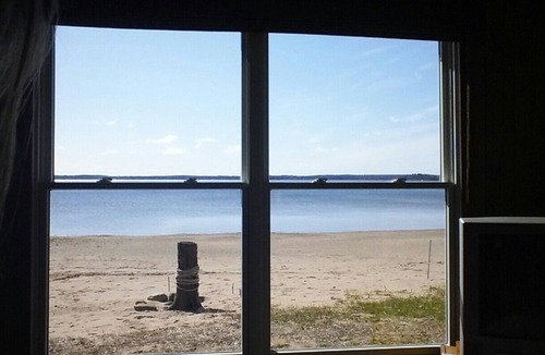 Shell Lake Cabin | The beach is calling.right outside your window. come relax and play!