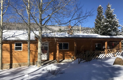 Holman Cabin | The Cabin back deck offers stunning views and only 15 minutes from Sipapu Skiing