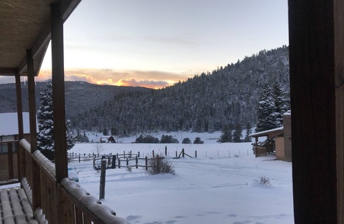 Holman Cabin | The Cabin back deck offers stunning views and only 15 minutes from Sipapu Skiing