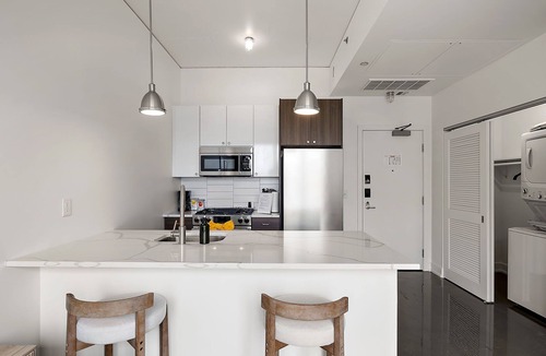 Warehouse District Apartment | TWO CozySuites NLG - Modern condo 14 and 15