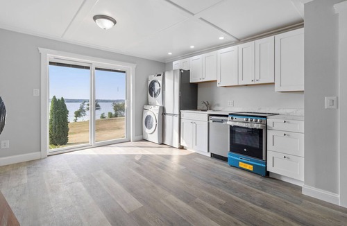 Ogdensburg Apartment | Victorian Riverfront 1BR Cozy Retreat with River Views & Dock Access
