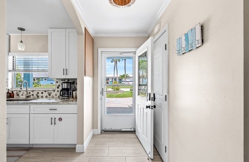 Convair Cove House | Waterfront Home with Pool | Walk to Beach | Family & Dog Friendly | Launch Views