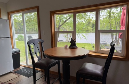 Eau Claire House | Waterfront legacy farm cottage house with WiFi, AC in lovely Eau Claire