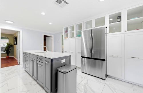 Largo House | Waterfront Villa! Heated Pool, Paddle Boards, and Game Room, Sleeps 20!