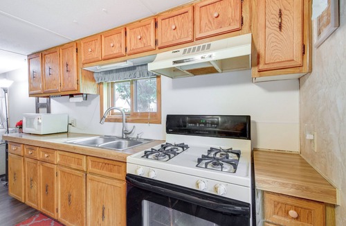 Isle House | Waterfront Wahkon Home w/Wraparound Deck & Docks