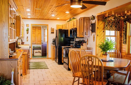 Augusta House | Welcome to your perfect getaway on the serene shores of Lake Eau Claire!