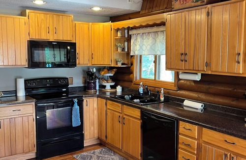 Merrill House | Wisconsin River Getaway. Large yard and shoreline. Pet friendly.