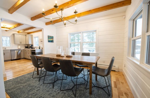 Jericho House | Woodlands: Luxury Vermont log cabin with sweeping views of field and forest.