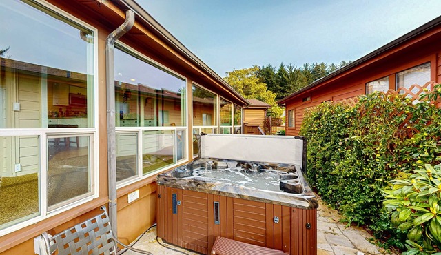Oceanfront home with private hot tub, walls of glass & spectacular view