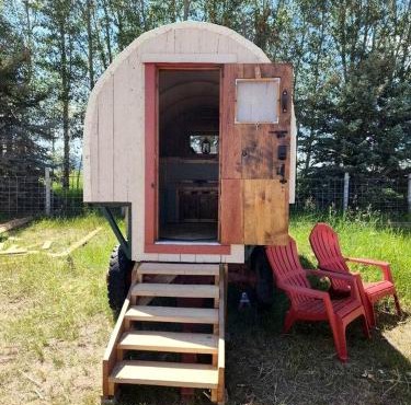 Rustic Sheep Wagon Glamping Retreat with Cowboy Ranch Views near Grand Tetons in Tetonia, Idaho