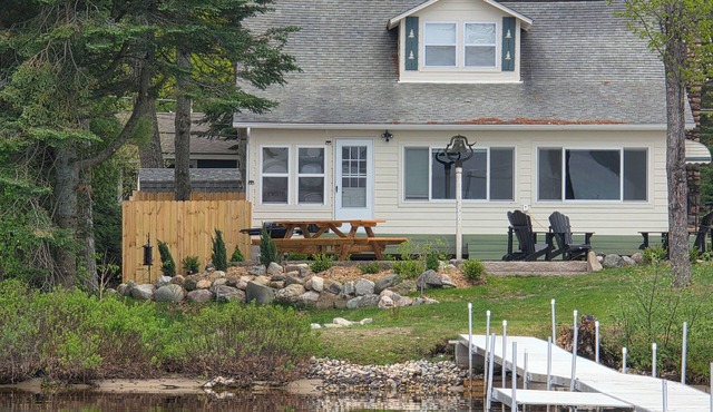 Stunning Sunsets. Dock. Huge deck/stamped patio w outdoor fire pit. Sandy Shore.