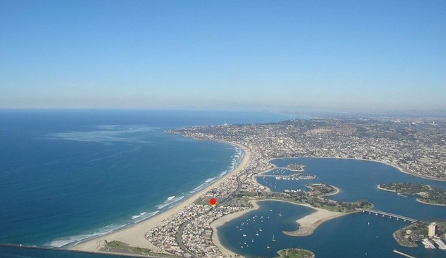 Top Floor ~ Water views ~ Steps to beach ~ Garage!