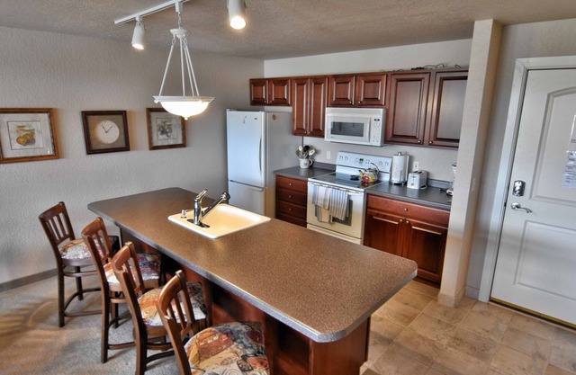 T306 Beautiful condo on Tagalong Golf Course overlooking Red Cedar lake