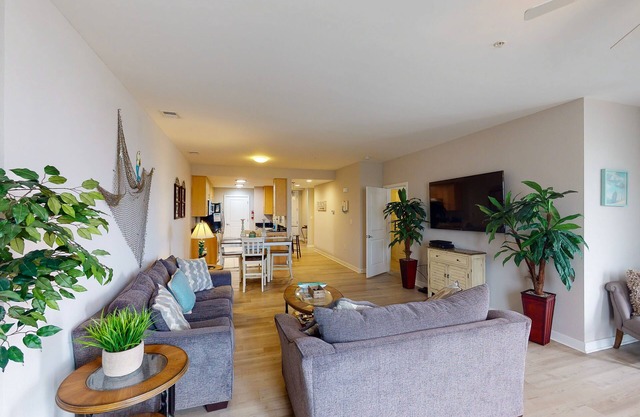 Updated condo with balcony & pools - steps to the beach