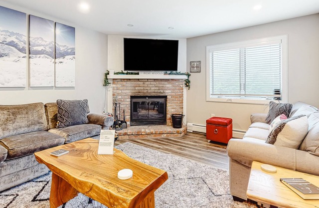 Updated condo with water views, fireplace, ski-in/out, washer/dryer, & tennis