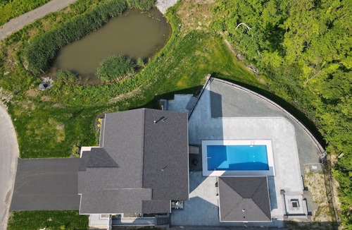 Newtonville House | Modern Spacious 6-Bedroom Home with Heated Pool and Pool House 20 min from Track